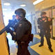 Police search through a Brooklyn high school during an active shooter drill on May 15, 2016 (NYPD)
